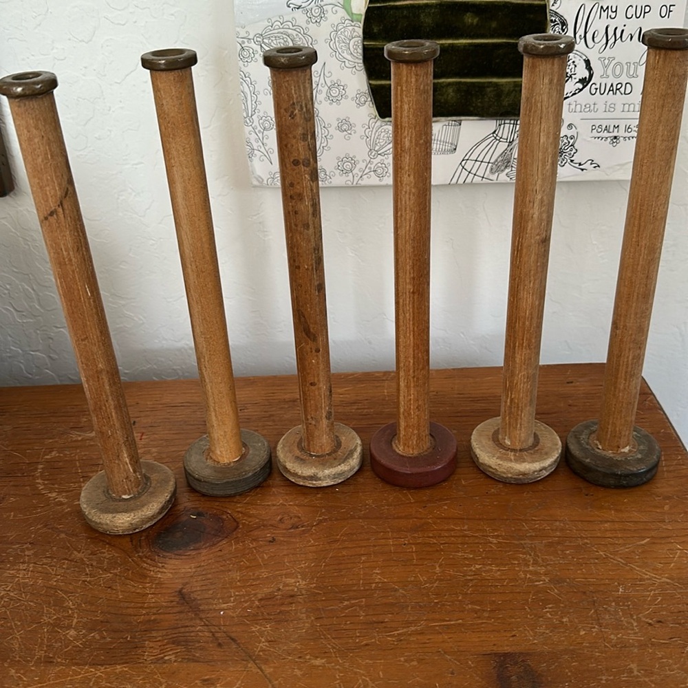Antique spools 11”tall